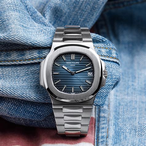 patek philippe nautilus gold black dial|patek philippe nautilus 5711 price.